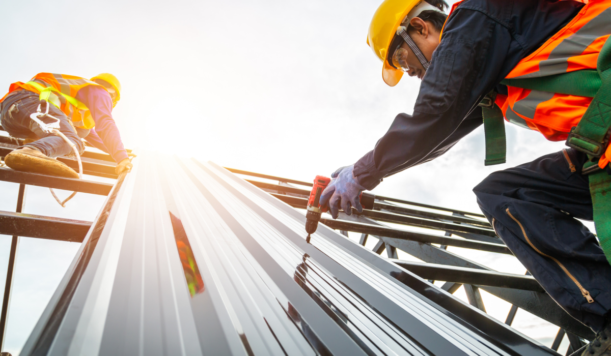 construction worker on the side of a building